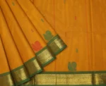 Kanchi Chettinad Cotton In Turmeric Yellow With Peacock Motifs