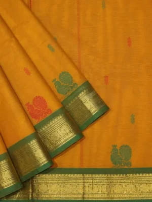Kanchi Chettinad Cotton In Turmeric Yellow With Peacock Motifs