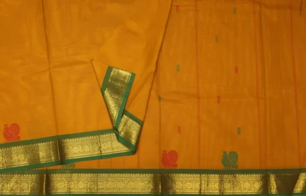 Kanchi Chettinad Cotton In Turmeric Yellow With Peacock Motifs