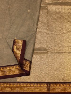 Grey Kanchi Chettinad cotton saree with gold zari border for traditional elegance.