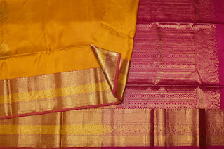 Soft Silk Saree In Yellowish Orange With Thilagam Motifs