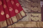 Pure Silk Cotton Saree In Maroon Shade With Floral Buttas
