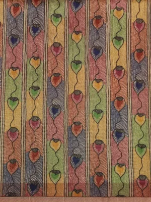 Close-up of Bandhani prints and Kalamkari motifs on deep red semi tussar saree