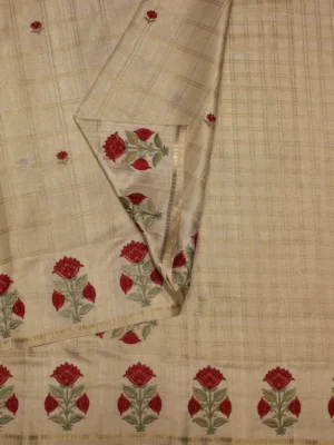 Close-up of red floral motifs and zari border on Cream Floral Semi Tussar Saree