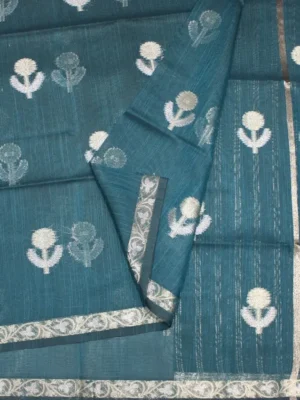 Close-up of silver zari butta motifs on Teal Blue Semi Tussar Saree