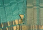 Kanchivaram Silk Saree In Self Color Shade With Zari Border