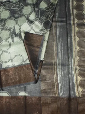 Close-up of abstract geometric print and Contrast Dark Brown Baavanchi border on Ash Grey Pure Tussar Silk Saree