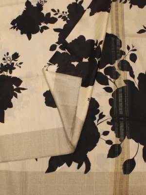 Close-up of black floral digital print and metallic zari border on Cream Beige Semi Tussar Saree