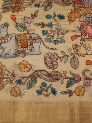 Close-up of Kalamkari floral, bird motifs and metallic tissue weave on Cream Beige Tissue Linen Saree