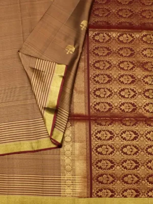 Close-up of gold zari buttas, woven grid texture and brocade pallu on Deep Maroon Pure Handloom Soft Silk Saree