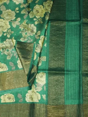 Close-up of ivory floral print and Contrast Olive Gold Baavanchi border on Emerald Green Pure Tussar Silk Saree