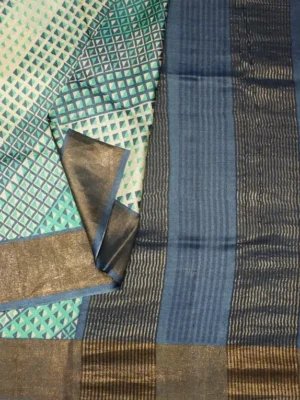 Close-up of geometric triangle print and Contrast Navy Blue Baavanchi border on Ivory Cream Pure Tussar Silk Saree