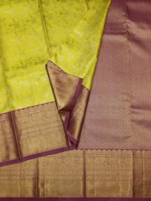 Close-up of Annapakshi motifs and Korvai gold zari border on Lime Green Brocade Soft Silk Saree