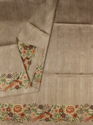 Khaki semi tussar saree in close up image