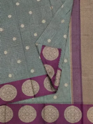 Close-up of black white Semi Chanderi saree with cream woven buttas