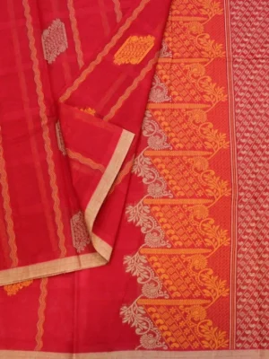 Close-up of golden zari floral motifs and geometric self pallu on brick red Kovai cotton saree