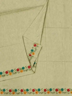 Close-up of colorful floral vine embroidery on Cream Semi Tussar Saree