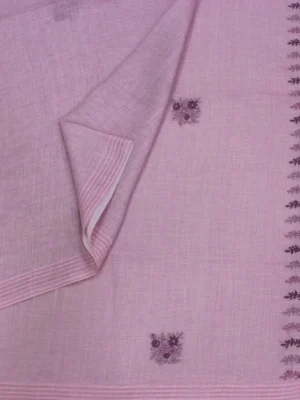 Close-up of plum floral embroidery buttas and geometric pallu design on Dusty Pink Linen Tissue Saree