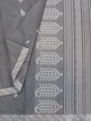 Close-up of white paisley motifs and geometric woven border on grey Kovai cotton saree