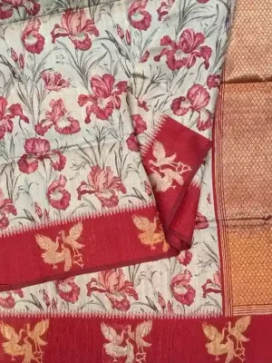 Close-up of Kalamkari floral print and gold zari pallu on Light Ash Semi Tussar Saree
