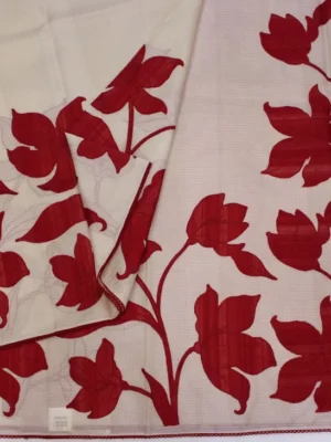 Close-up of deep maroon floral appliqué work and botanical border on Off White Kota Saree