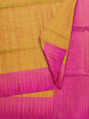 Close-up of geometric Jacquard checks, Rani pink temple border and gold zari brocade pallu on Mustard Yellow Soft Silk Saree