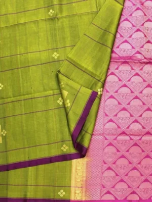 Close-up of gold zari checks, floral buttas and pink temple border on Olive Green Soft Silk Saree Close-up of gold zari checks, floral buttas and pink temple border on Olive Green Soft Silk Saree